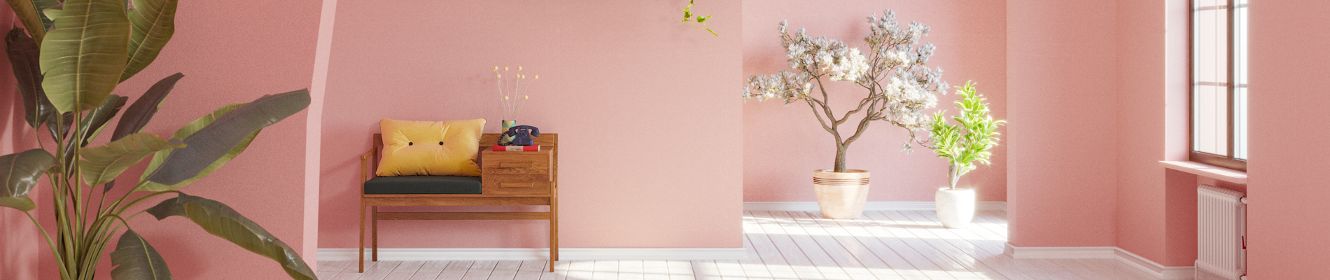 Pink and white room with plants and a phone chair